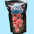 Liofilizowane Nerdsy Berry Punch Rush w torebce Frizle, czerwono-różowe grudki obsypane Nerdsami